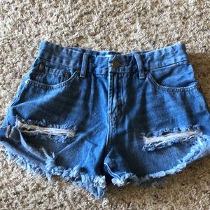 DISTRESSED DENIM SHORTS